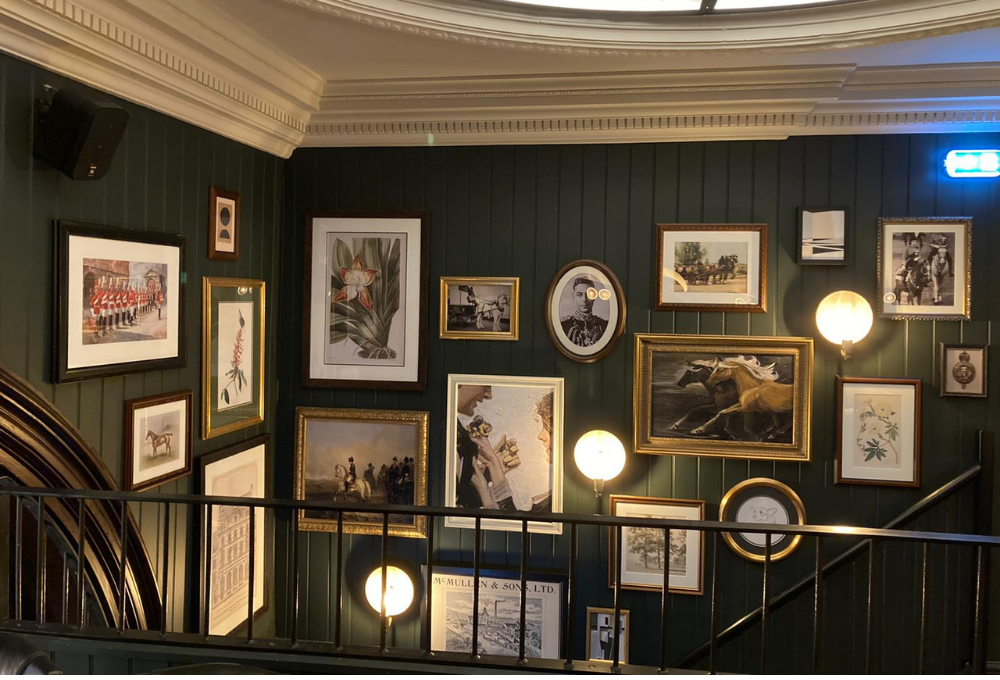 Horse and Guardsman staircase gallery wall - supplied by Indigo Art limited